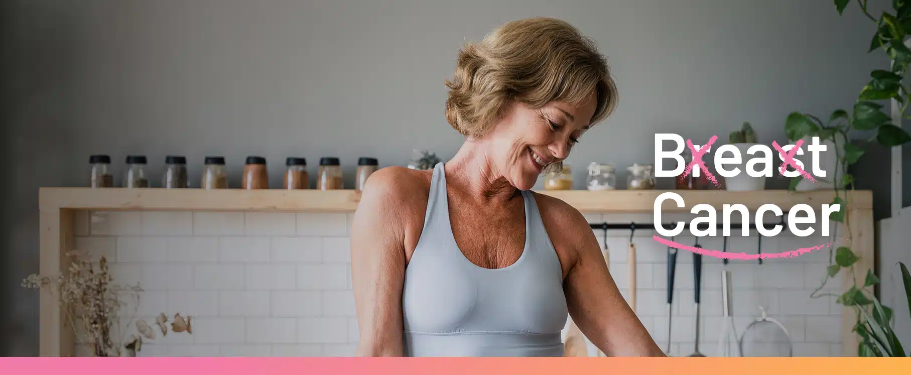 woman in her 40s in a sports bra at a kitchen counter