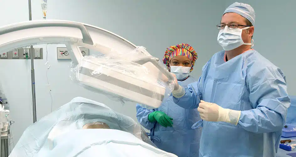 radiologist and tech performing kyphoplasty